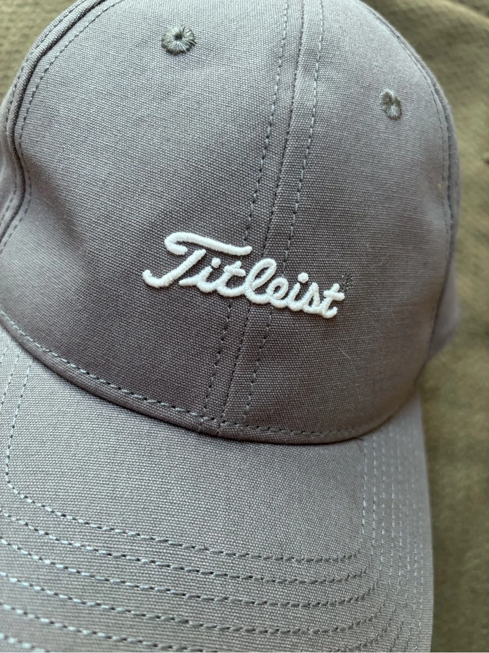 Titleist cap raised